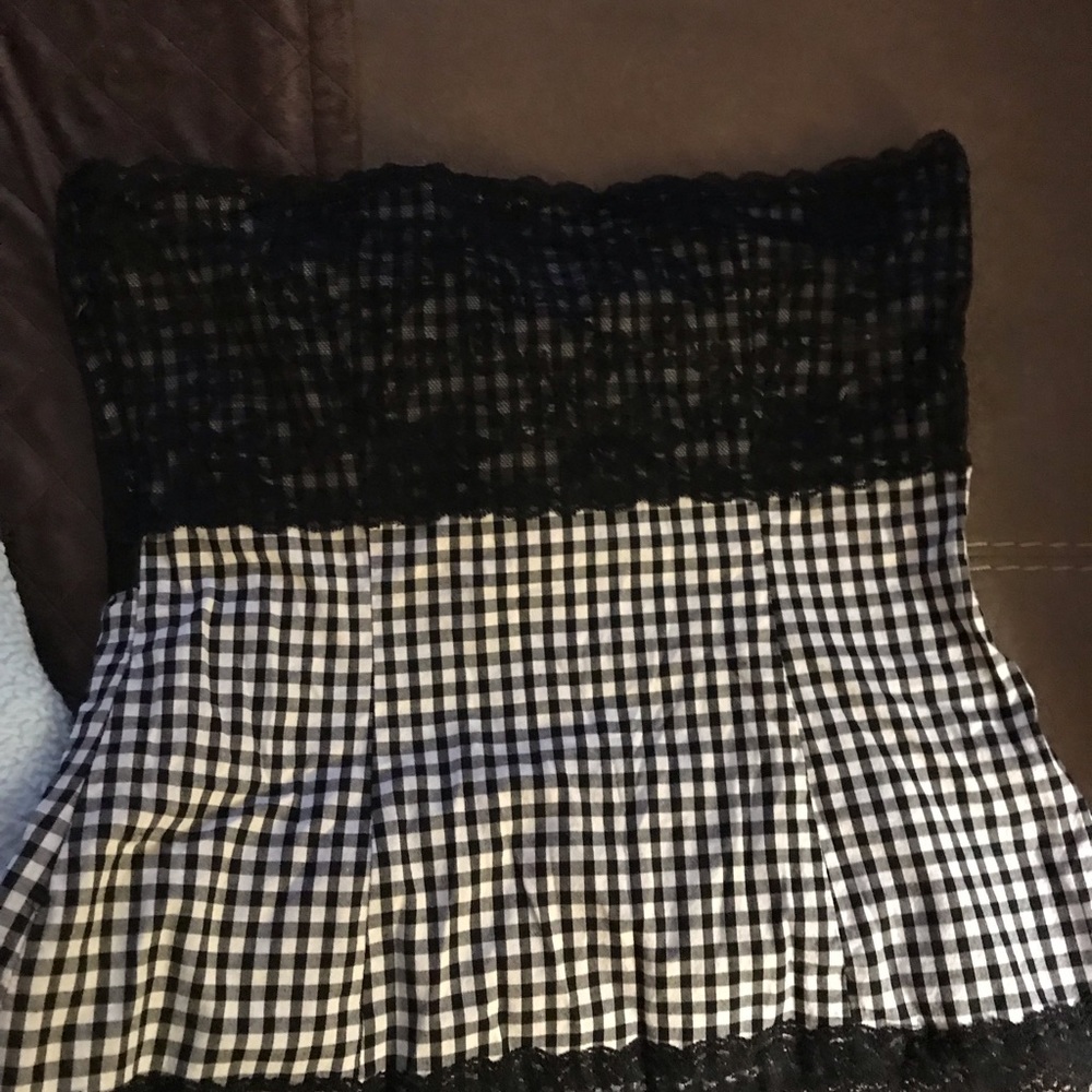 Sleeve less top. Size Medium Junior size.